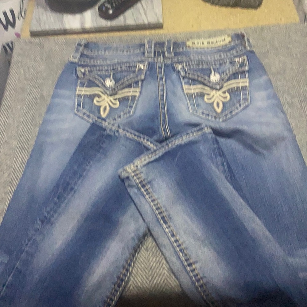 Gently worn rock revival jeans